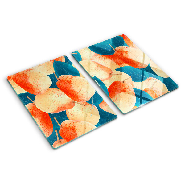 Planche à découper verre Pêches sur fond de feuilles
