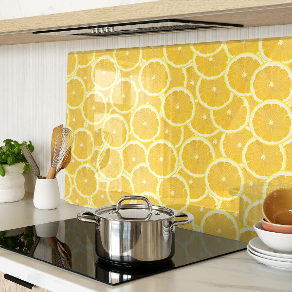 Planche à découper en verre Tranches de citron sur fond jaune