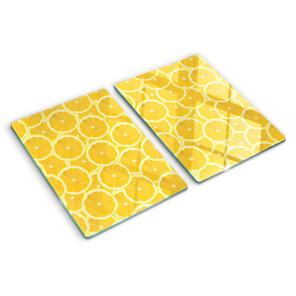 Planche à découper en verre Tranches de citron sur fond jaune