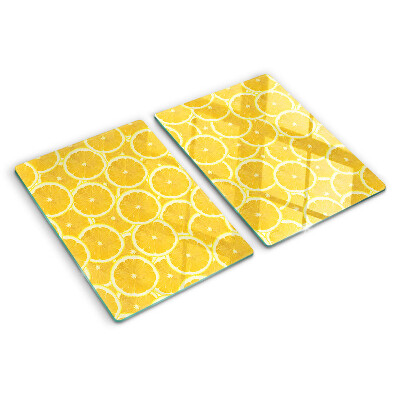 Planche à découper en verre Tranches de citron sur fond jaune