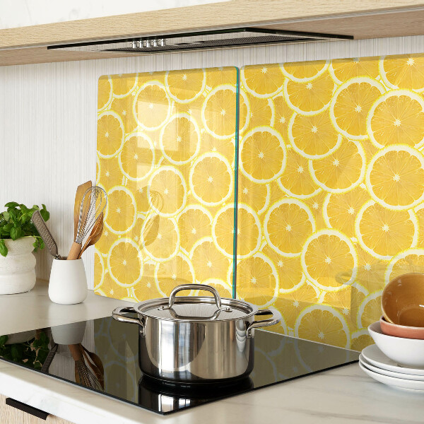 Planche à découper en verre Tranches de citron sur fond jaune
