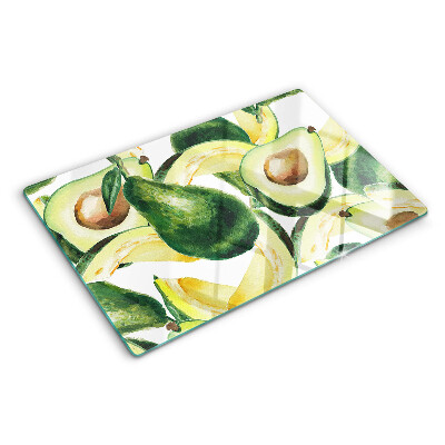Planche à découper verre Avocat avec des feuilles en arrière-plan