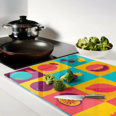 Planche à découper en verre Motif de fruits dans des carrés colorés