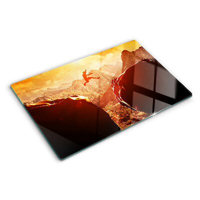 Planche à découper en verre Sauter dans les montagnes au coucher du soleil
