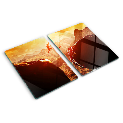 Planche à découper en verre Sauter dans les montagnes au coucher du soleil