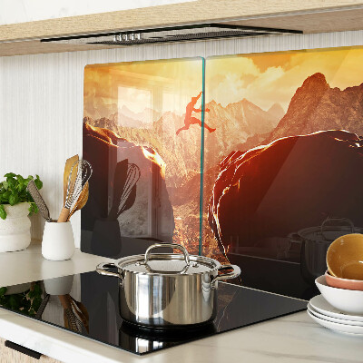 Planche à découper en verre Sauter dans les montagnes au coucher du soleil