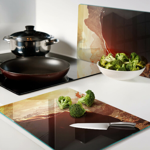 Planche à découper en verre Sauter dans les montagnes au coucher du soleil