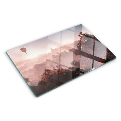 Planche à découper verre Montgolfière au-dessus du paysage