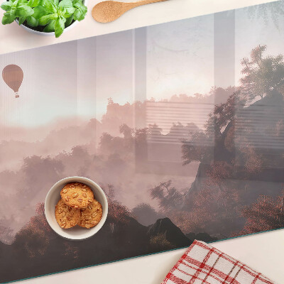 Planche à découper verre Montgolfière au-dessus du paysage