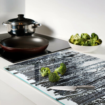 Planche à découper en verre Forêt d'hiver avec des bouleaux
