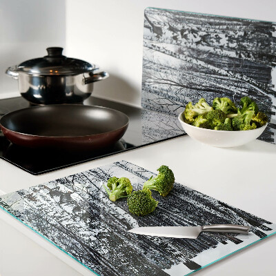 Planche à découper en verre Forêt d'hiver avec des bouleaux