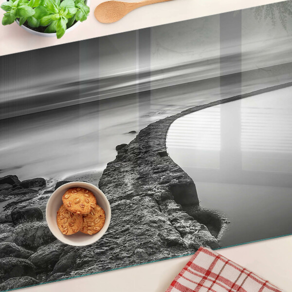 Planche à découper verre Un paysage de bord de mer aux nuances de gris
