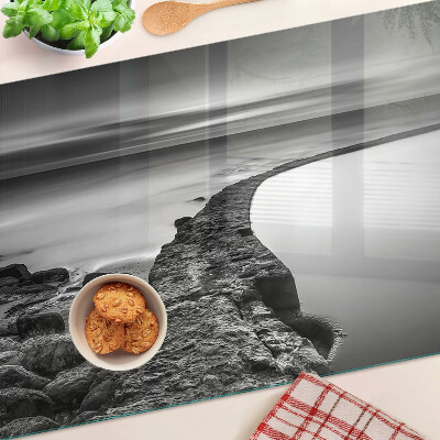 Planche à découper verre Un paysage de bord de mer aux nuances de gris