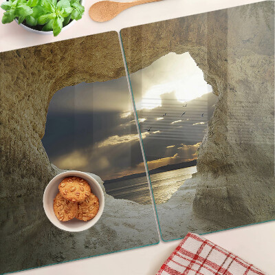 Planche à découper verre Vue sur la mer à travers la grotte