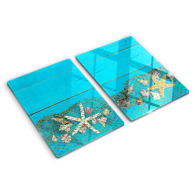 Planche à découper verre Coquillages et étoiles de mer dans un filet