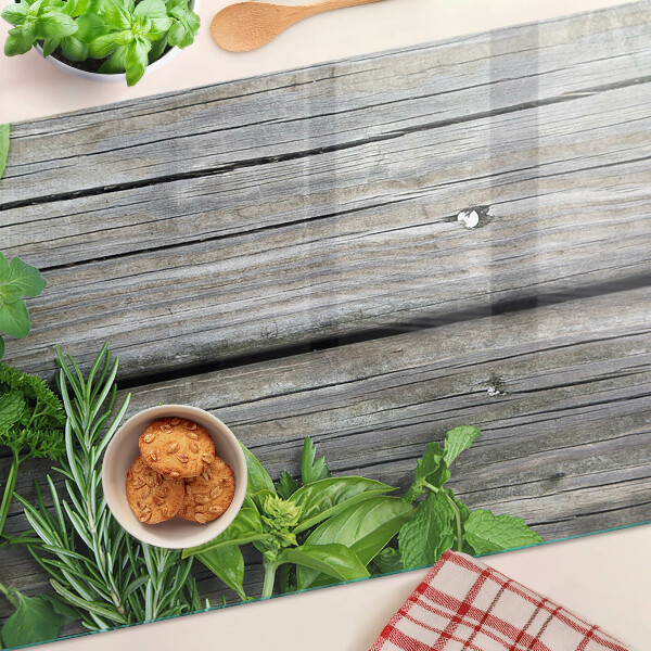 Planche à découper en verre Herbes vertes sur fond de bois