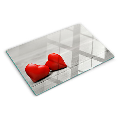 Planche à découper verre Coeurs rouges sur fond de bois