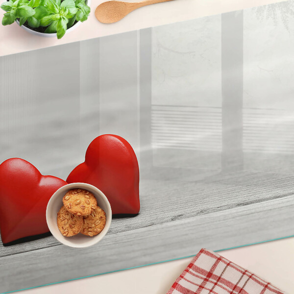 Planche à découper verre Coeurs rouges sur fond de bois