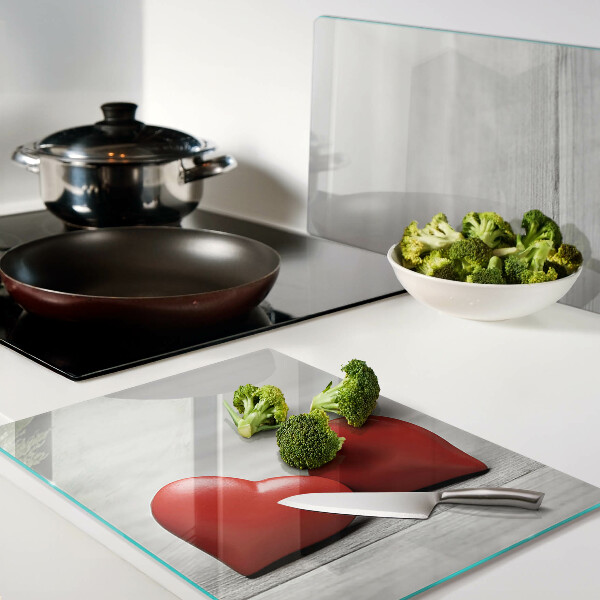 Planche à découper verre Coeurs rouges sur fond de bois