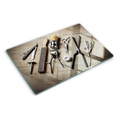 Planche à découper verre Outils de coiffure sur fond de bois