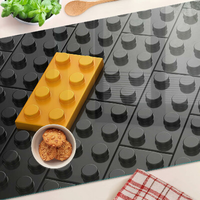 Planche à découper en verre Briques LEGO sur fond noir