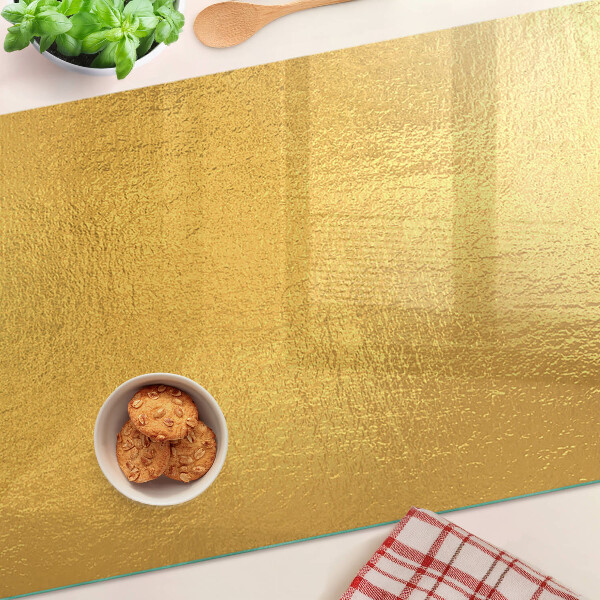 Planche à découper en verre Surface dorée avec reflets