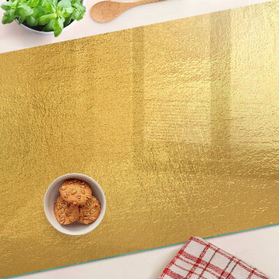 Planche à découper en verre Surface dorée avec reflets