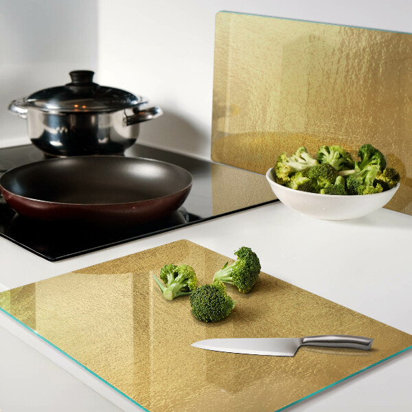 Planche à découper en verre Surface dorée avec reflets