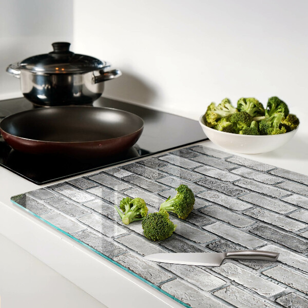 Planche à découper en verre Mur de briques dans des tons de gris