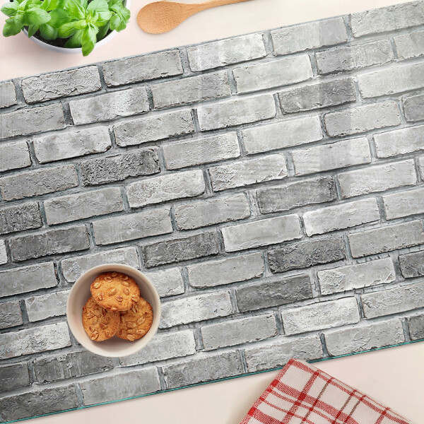 Planche à découper en verre Mur de briques dans des tons de gris