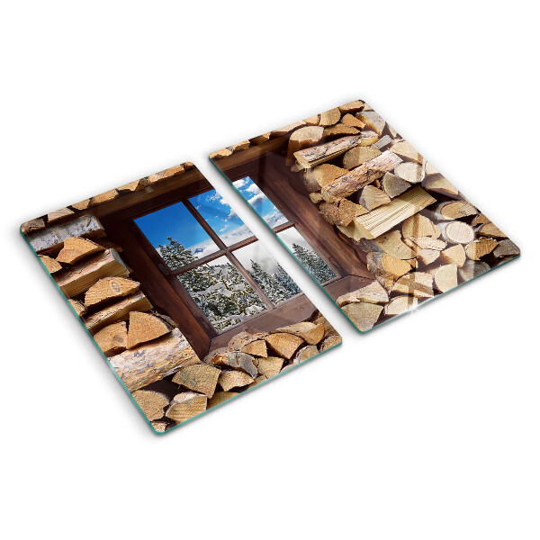 Planche à découper en verre Vue d'un paysage d'hiver à travers la fenêtre