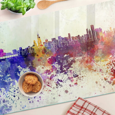 Planche à découper verre Panorama de la ville en taches colorées