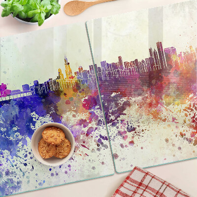 Planche à découper verre Panorama de la ville en taches colorées