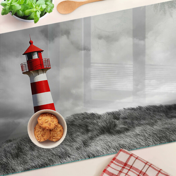 Planche à découper verre Un phare dans le paysage