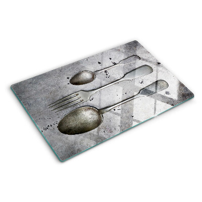 Planche à découper verre Couverts sur fond de béton