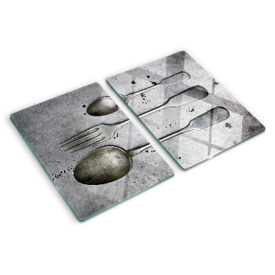 Planche à découper verre Couverts sur fond de béton