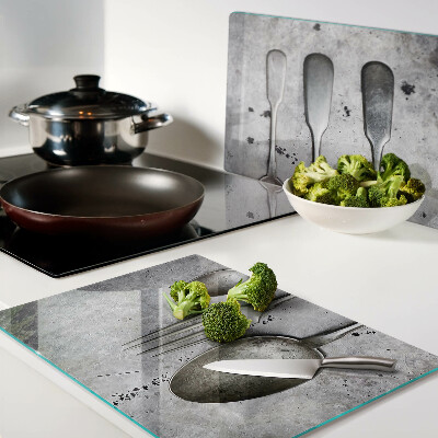 Planche à découper verre Couverts sur fond de béton