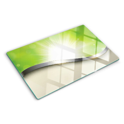 Planche à découper en verre Bokeh vert avec des rayons de lumière