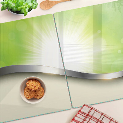 Planche à découper en verre Bokeh vert avec des rayons de lumière