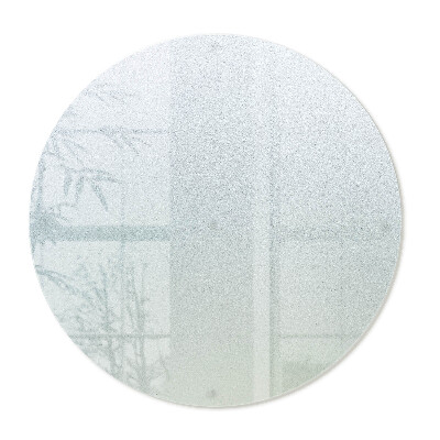 Planche à découper en verre de forme ronde semi-transparente