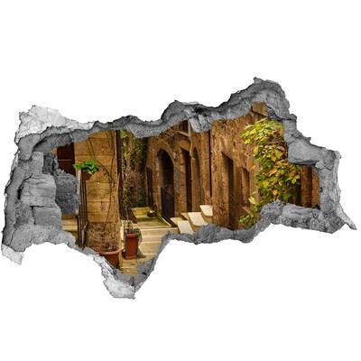 Autocollant à effet 3d trou Une rue charmante de la ville