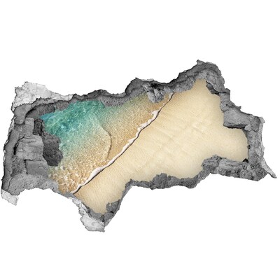 Autocollant mural trou Plage des Caraïbes à travers un trou dans le mur