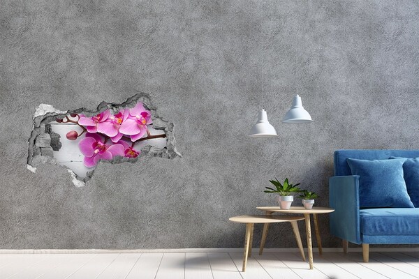 Sticker mural effet trou 3d Des orchidées fleurissent à travers un trou dans le mur