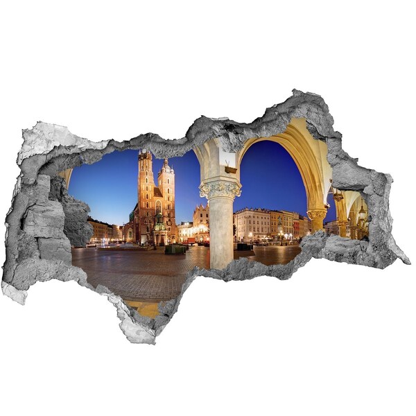 Sticker trou dans le mur La place du marché principal de Cracovie la nuit