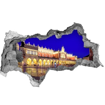 Autocollant mural trou La place du marché principal de Cracovie la nuit