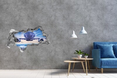 Sticker mural effet trou 3d Avion au-dessus de la ville béton