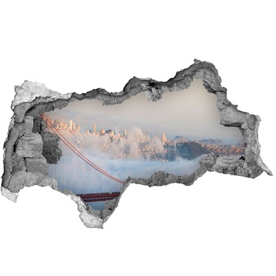 Autocollant mural trou Le pont du Golden Gate dans les nuages