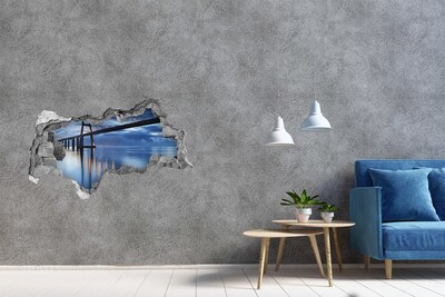 Sticker mural effet trou 3d Un pont au-dessus de l'eau dans une scène nocturne