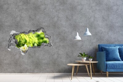 Sticker trou dans le mur Une fleur dans un jardin verdoyant