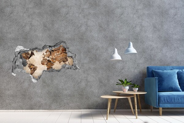 Autocollant mural trou Un mur endommagé avec une carte du monde